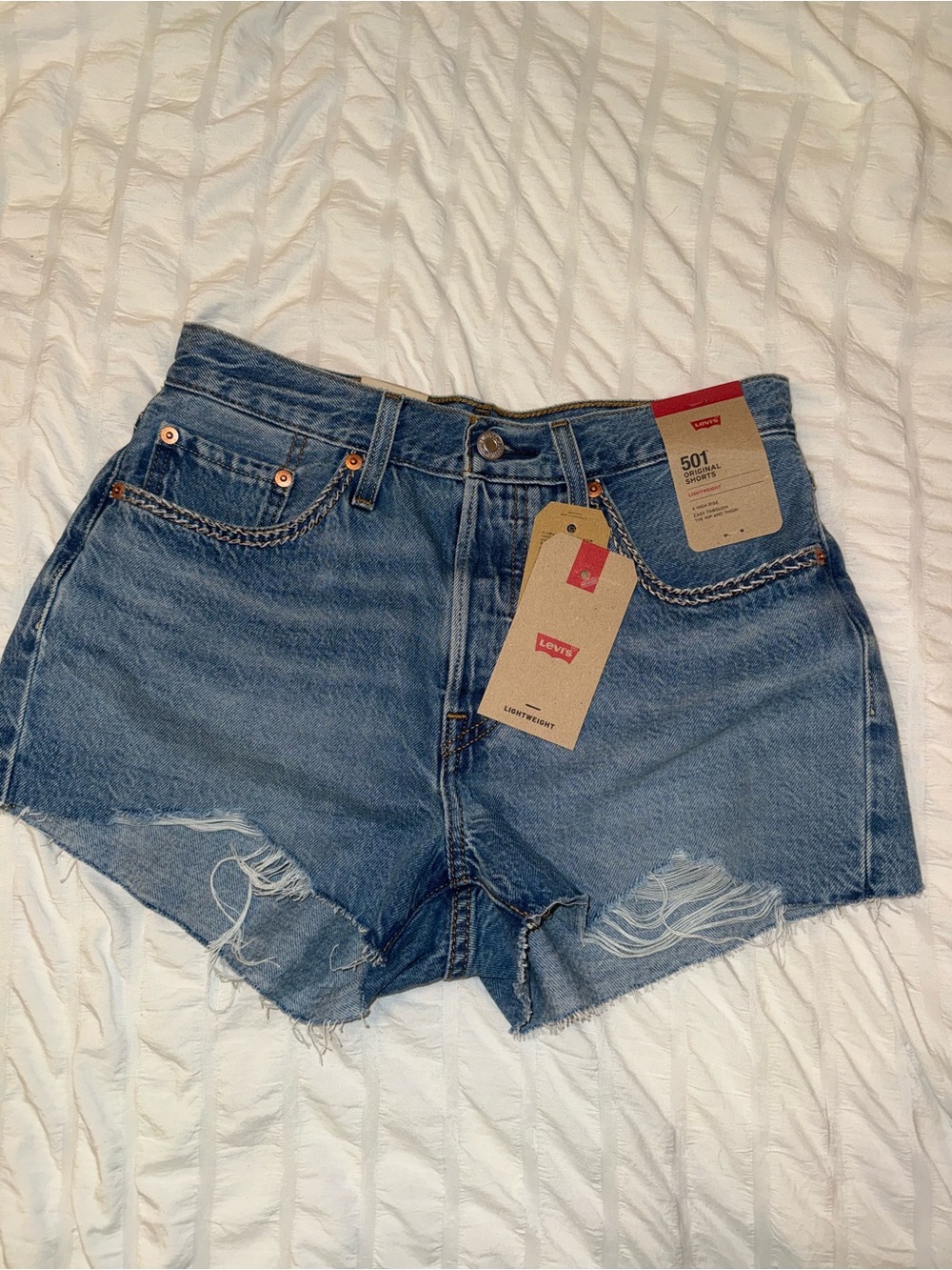 Levi's Distressed Mid-Blue Denim Cutoff Shorts